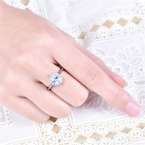 Classical Oval Sterling Silver Flower Ring with CZ Halo